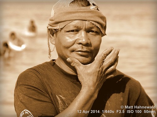 male adult cap consent emotion portrait posing beach fisherman travel depthoffield bokeh grinning gesture bodylanguage character closeup street sepia eyes asia matthahnewaldphotography face facingtheworld eastasia horizontal head nikond3100 outdoor philippines hand siquijor oneperson seveneighthsview expression headshot nikkorafs50mmf18g 4x3ratio 1200x900pixels resized lookingatcamera