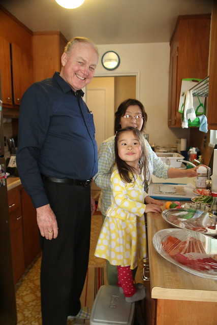 Mio in the kitchen with grandparents