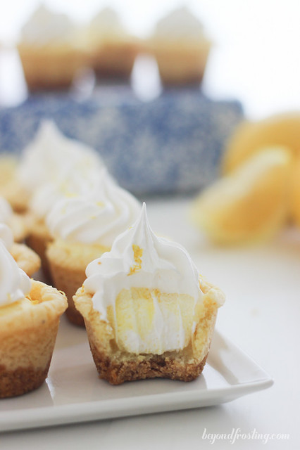These Lemon Cream Pie Cookie Cups will knock you socks off. Full of lemon flavor, these cookie cups have an easy lemon mousse filling and topped with Fresh Whipped Cream. 