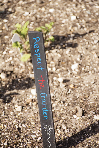 A garden marker made by students